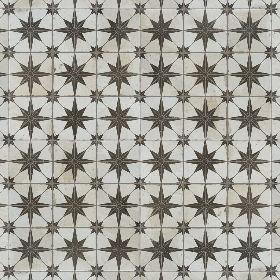 Geometric tile pattern featuring black eight-pointed stars inside hexagonal white tiles, repeated uniformly in a grid across the surface. The overall design creates a striking, symmetrical visual effect.