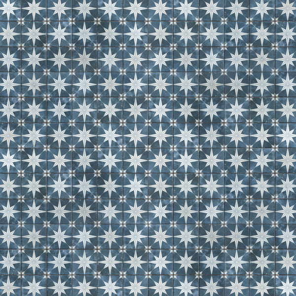 Blue and gray tiled pattern featuring white eight-pointed stars arranged in a grid, creating a repeating geometric design across the surface.