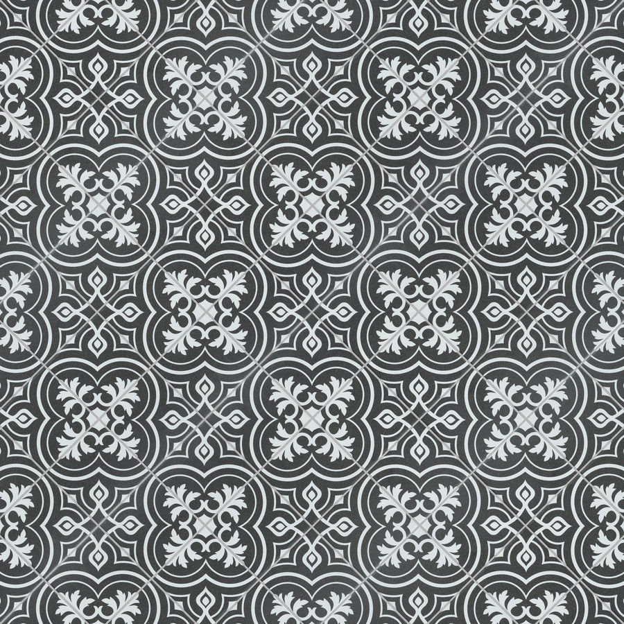 Black and white geometric tile pattern with floral and quatrefoil motifs, featuring intricate symmetrical designs and repeating shapes throughout the image.