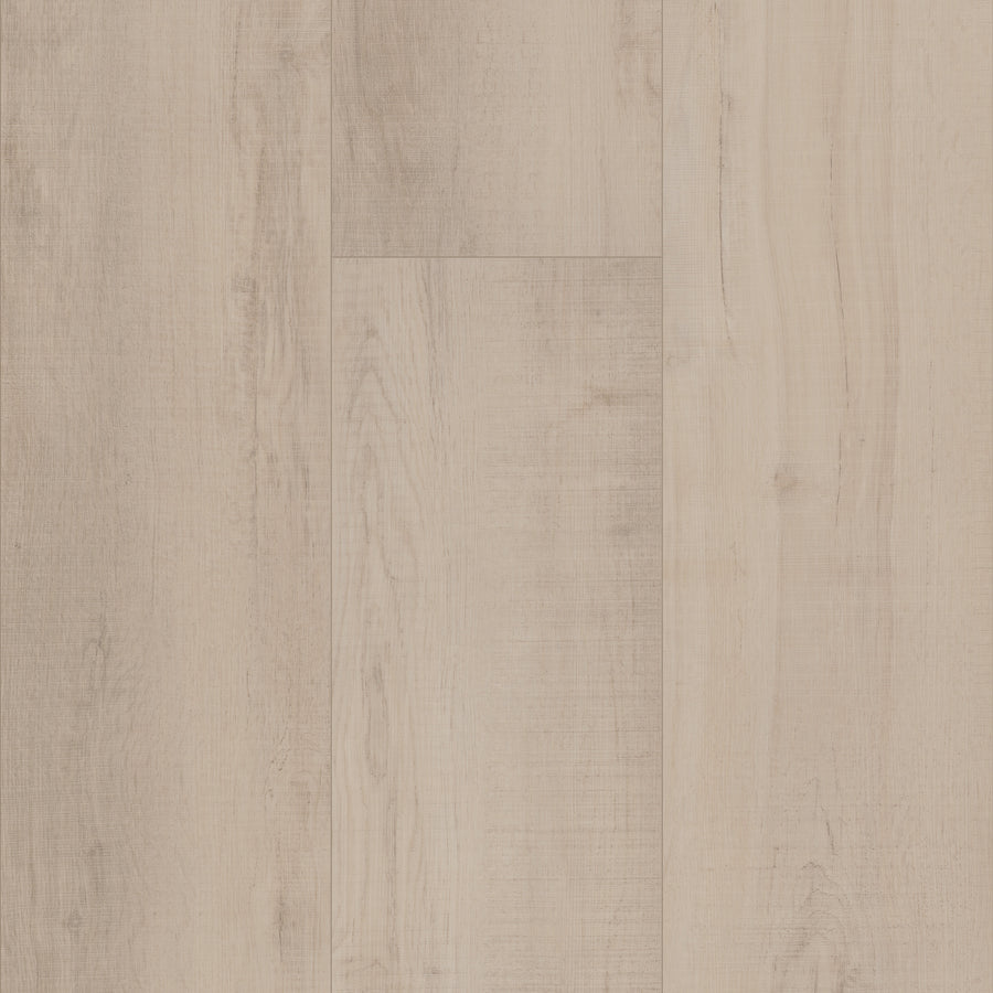 Coretec Plus XL Enhanced Vinyl features light-colored luxury planks with natural grain and subtle knots, arranged side by side for a smooth, clean look. Its waterproof durability makes it an ideal flooring choice.
