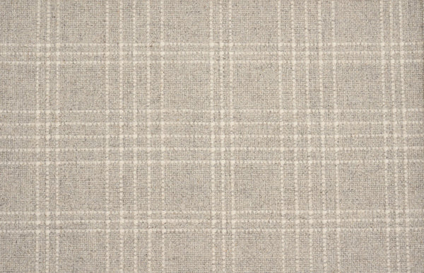 A close-up of the Pristine Plaid Berber Carpet in Heather shows its beige and off-white grid pattern, ideal for adding sophisticated style and durability to any space.