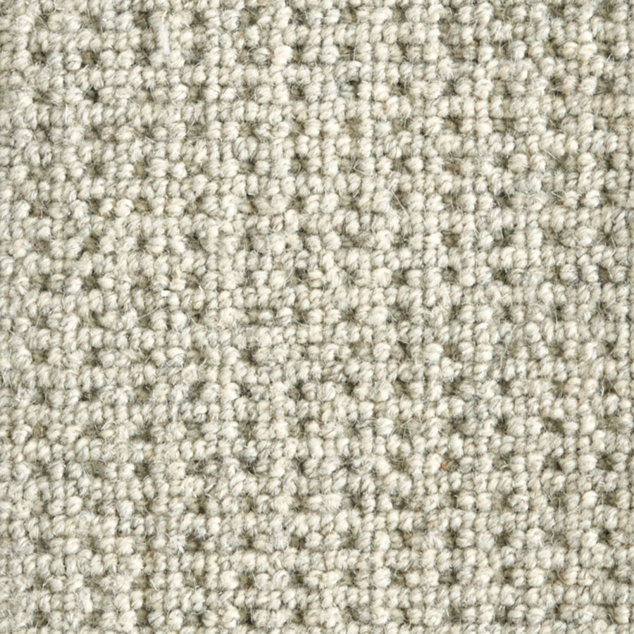 Close-up of Timbers Berber Carpet in Heather, featuring a textured loop-pile with subtle color variations and an even woven pattern for a modern flooring look.