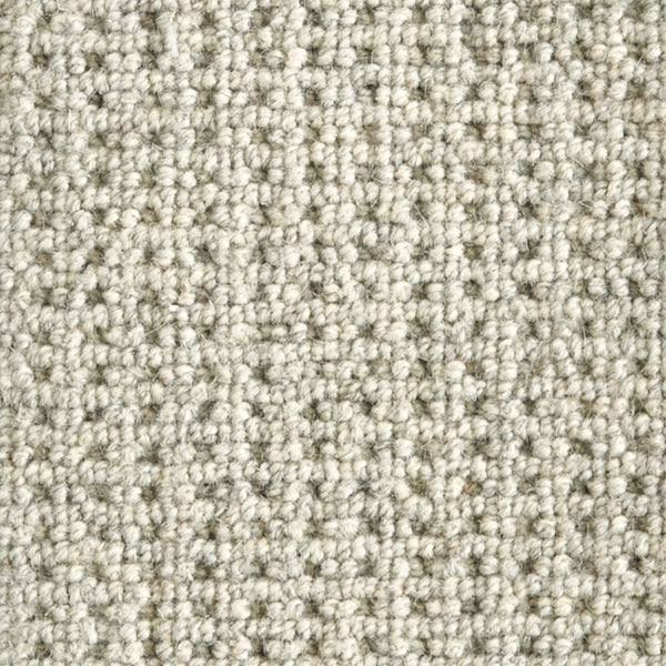 Close-up of Timbers Berber Carpet in Heather, featuring a textured loop-pile with subtle color variations and an even woven pattern for a modern flooring look.