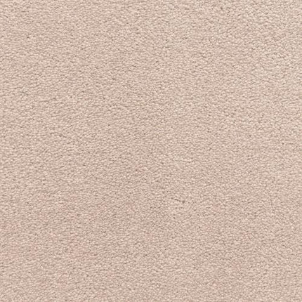 A close-up of the Grand Isle Family Friendly Carpet in Highlands color shows its light beige, even textured, and slightly fuzzy surface—ideal for creating a soft, luxurious look suitable for any family space.