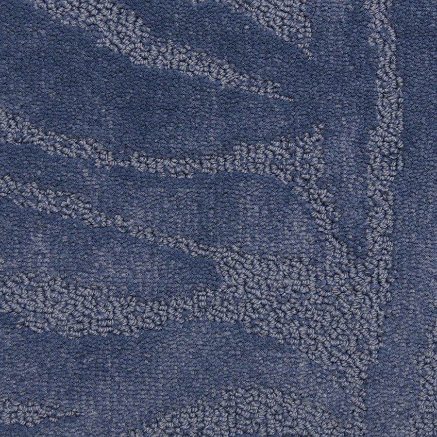 Close-up of Capetown On Trend Carpet in Hout Bay: textured blue luxury flooring with a raised, flowing pattern resembling abstract branches or waves in lighter blue—perfect for high-traffic areas.