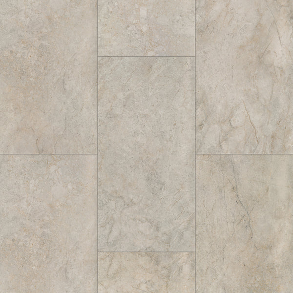 A close-up of light gray and beige Coretec Plus Tile Luxury Vinyl Tile, featuring natural veining and an offset brick pattern, highlights the elegance of this waterproof flooring with its authentic tile-look design.