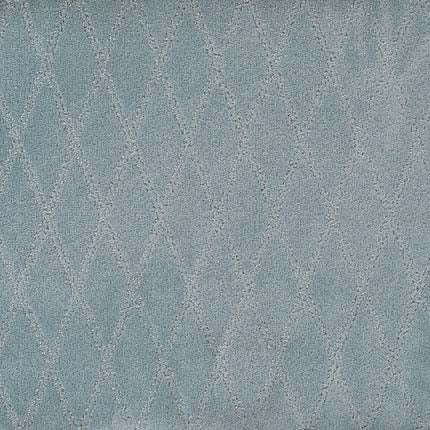 Absolute Berber Carpet in Ideal color features a light blue textured surface with a subtle diamond pattern of raised lines; its durable, uniform design is perfect for high-traffic areas and covers the image entirely.