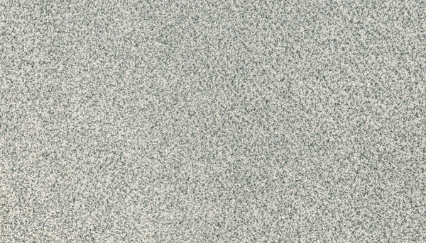 Close-up of Innovative Comfort I Pet Friendly Carpet in Confetti—a speckled gray and white surface that adds a stylish, high-end look to modern spaces.