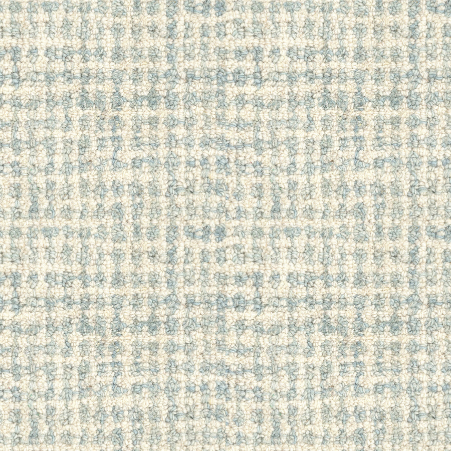 A close-up of the Inspiration On Trend Carpet shows a woven plaid pattern in light beige and soft blue, with intersecting lines and raised fibers for a stylish, textured look.