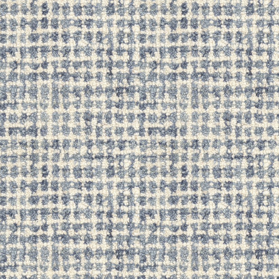 A close-up of the Inspiration On Trend Carpet, showcasing its blue and white plaid pattern with intersecting lines for a soft, woven look—ideal for adding stylish texture to any space.