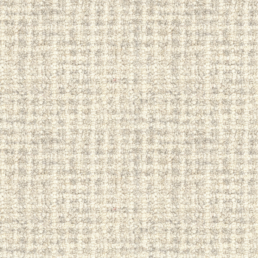 A close-up of the Inspiration On Trend Carpet shows its soft, stylish texture with a woven checkered pattern in neutral beige and light gray tones and a slightly raised finish.