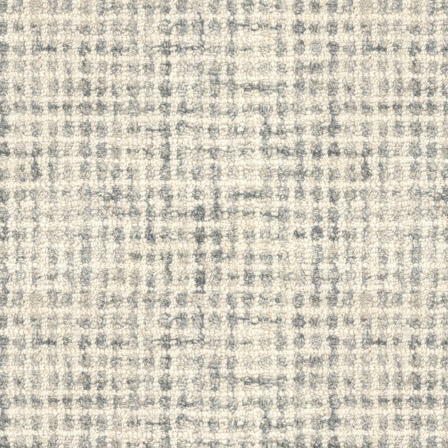 Close-up of the Inspiration On Trend Carpet, showcasing a woven plaid pattern in light gray and beige with gently irregular intersecting lines for a sophisticated, textured look.
