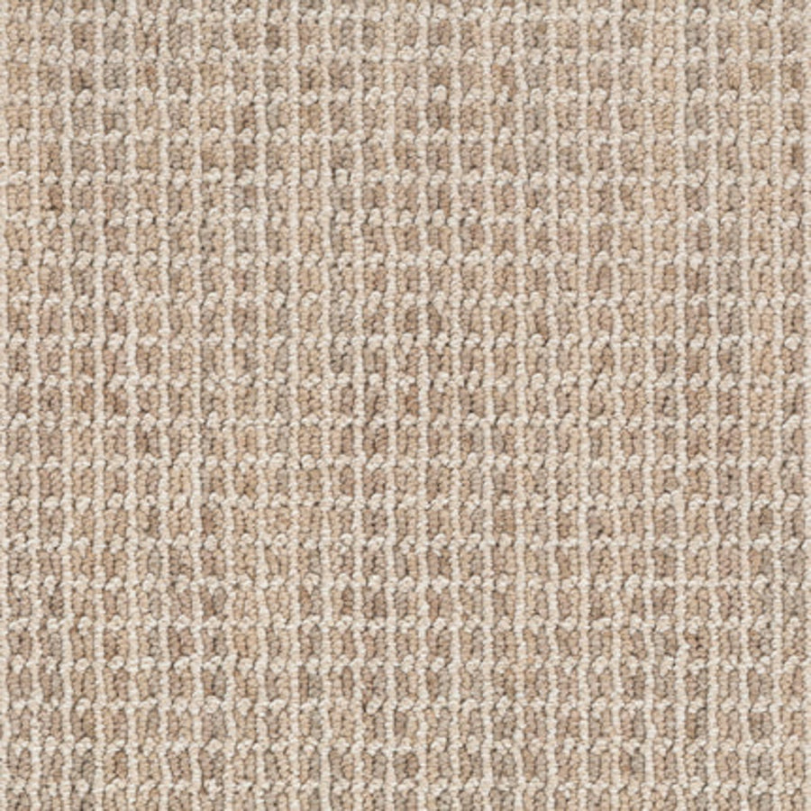 Close-up of the Haven Berber Carpet in Ivory, featuring a grid-like textured pattern with light and medium brown fibers for a subtle, repetitive geometric design.
