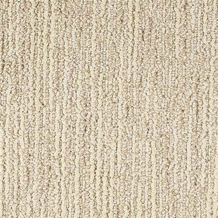Close-up of Advocate Berber Carpet in Jackpot color, displaying its durable texture and subtle vertical striped pattern formed by loops of varying heights and shades.
