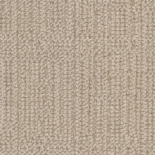 Close-up of the Occasion On Trend Carpet in Joyus, featuring a beige looped pile with a subtle linear pattern for a soft, uniform, and textured premium appearance.
