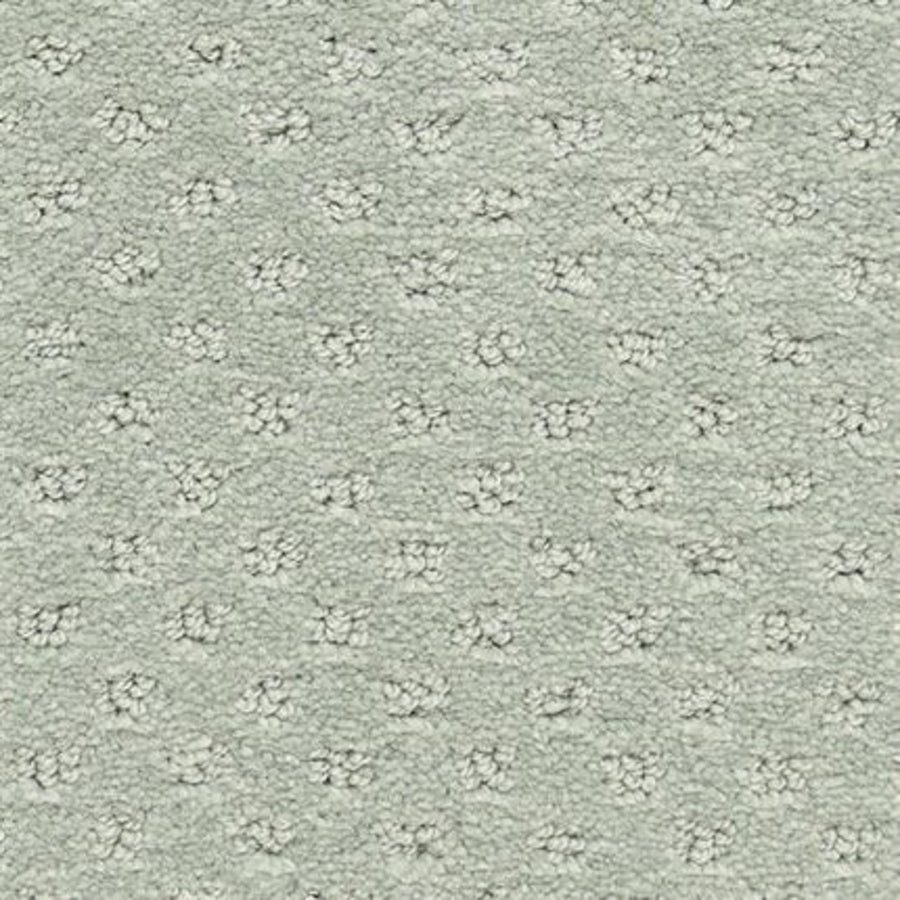 Dreamer On Trend Carpet in June features plush, textured light gray fibers with a repeating pattern of small, raised flower-like clusters—an elegant choice for luxury flooring.