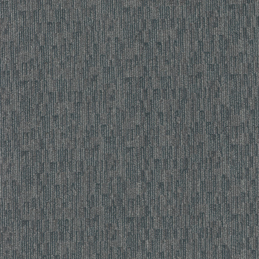 Close-up of Sneak Peak Berber Carpet in Juniper, featuring a textured, soft looped surface with a dense pile and a subtle pattern of thin vertical and horizontal lines in varying gray and blue tones for durable flooring.