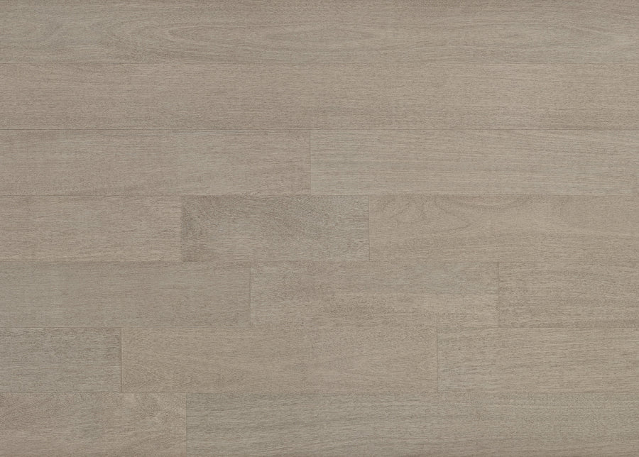 Prime Exotic 9/16" x 7 1/2" Brazilian Oak Hardwood features light brown tones, a subtle grain pattern, and rectangular planks in a staggered layout for a smooth, uniform exotic flooring look.