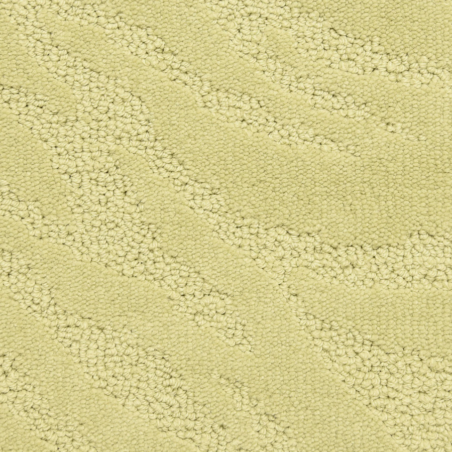 Close-up of Capetown On Trend Carpet in Kirstenbosch—light beige with a textured, wavy pattern from varied loop heights and densities. Its soft, plush surface makes it perfect for high-traffic areas while remaining stylish.