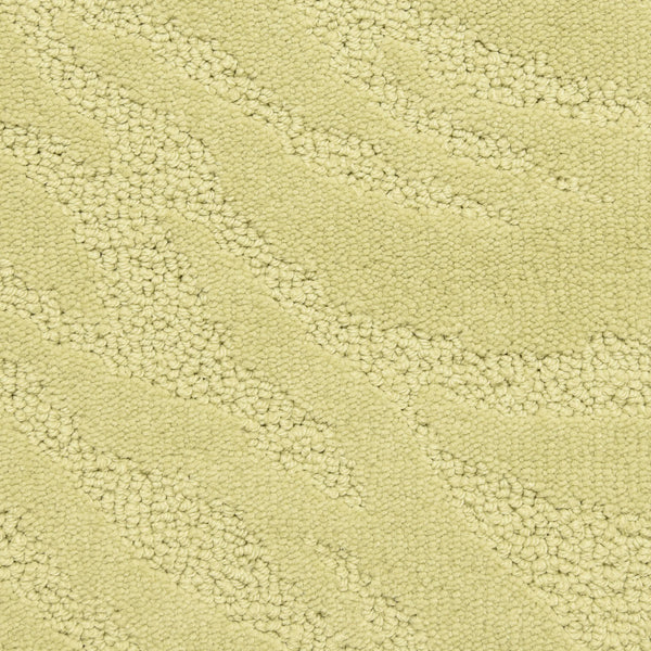 Close-up of Capetown On Trend Carpet in Kirstenbosch—light beige with a textured, wavy pattern from varied loop heights and densities. Its soft, plush surface makes it perfect for high-traffic areas while remaining stylish.