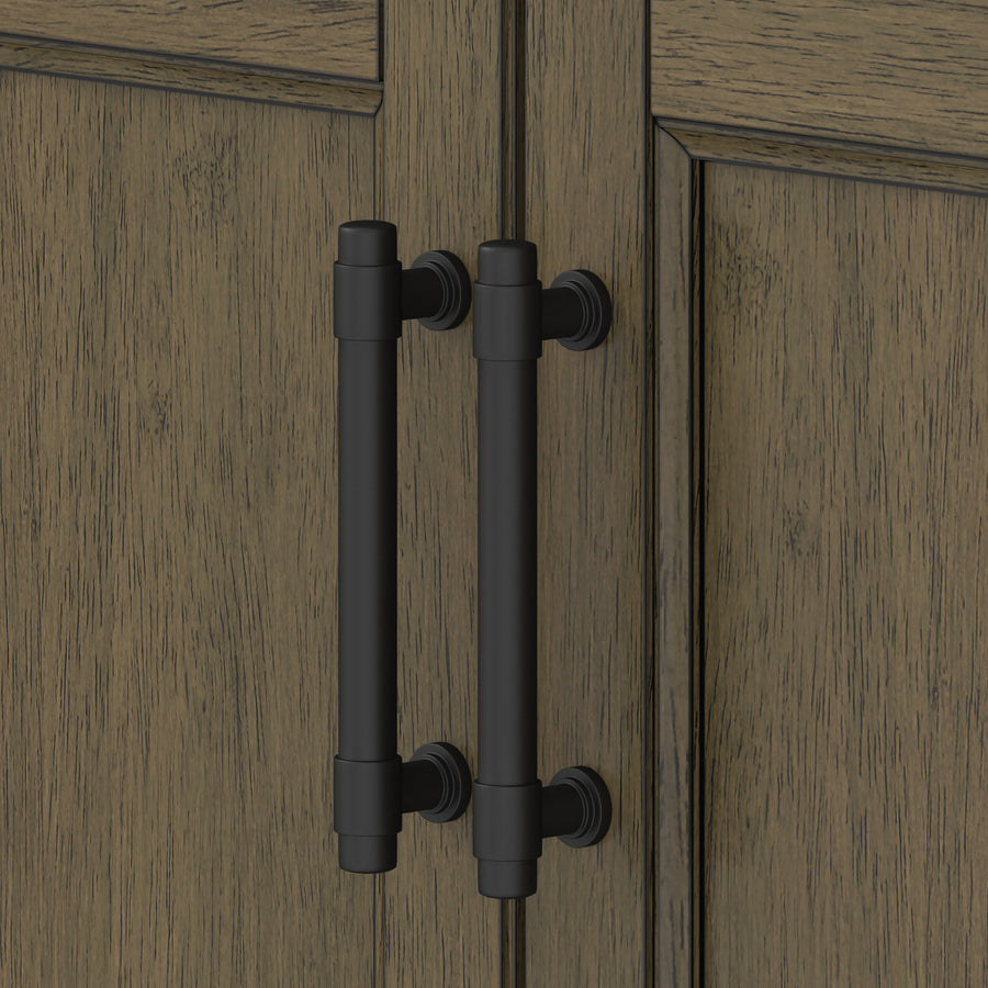 Close-up of two black metal handles on wooden cabinet doors with a natural, textured brown finish. The handles are mounted vertically and positioned side by side at the seam of the cabinet.