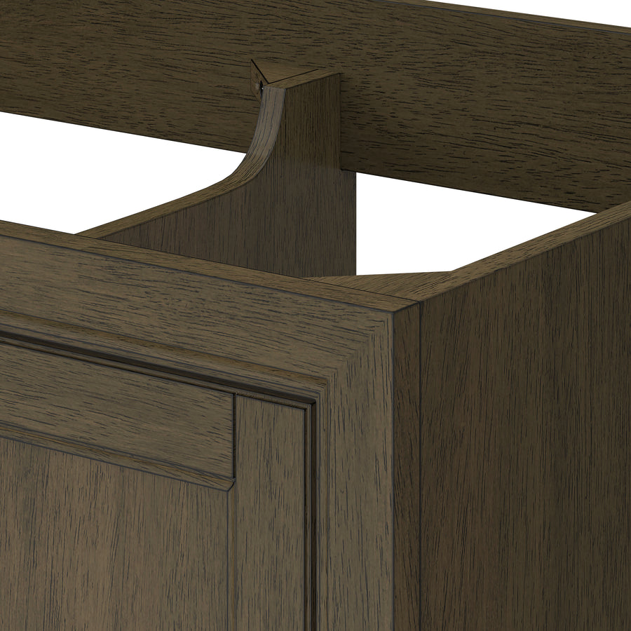 Close-up of a wooden cabinet with a decorative cutout at the back edge, showing the detailed wood grain and panel design in a dark brown finish. The top and part of the interior frame are visible.