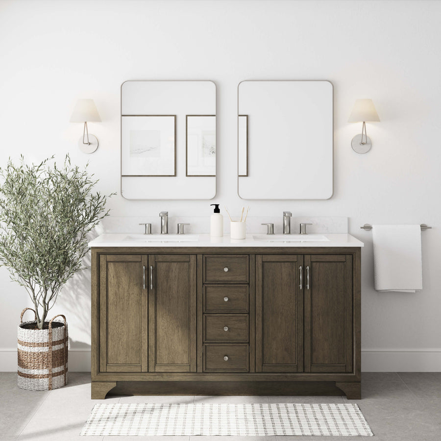 A modern bathroom featuring the Lanagan 60" Vanity, two rectangular mirrors, wall-mounted lights, a white towel on a rack, framed pictures, a potted plant, and a white rug on the floor.