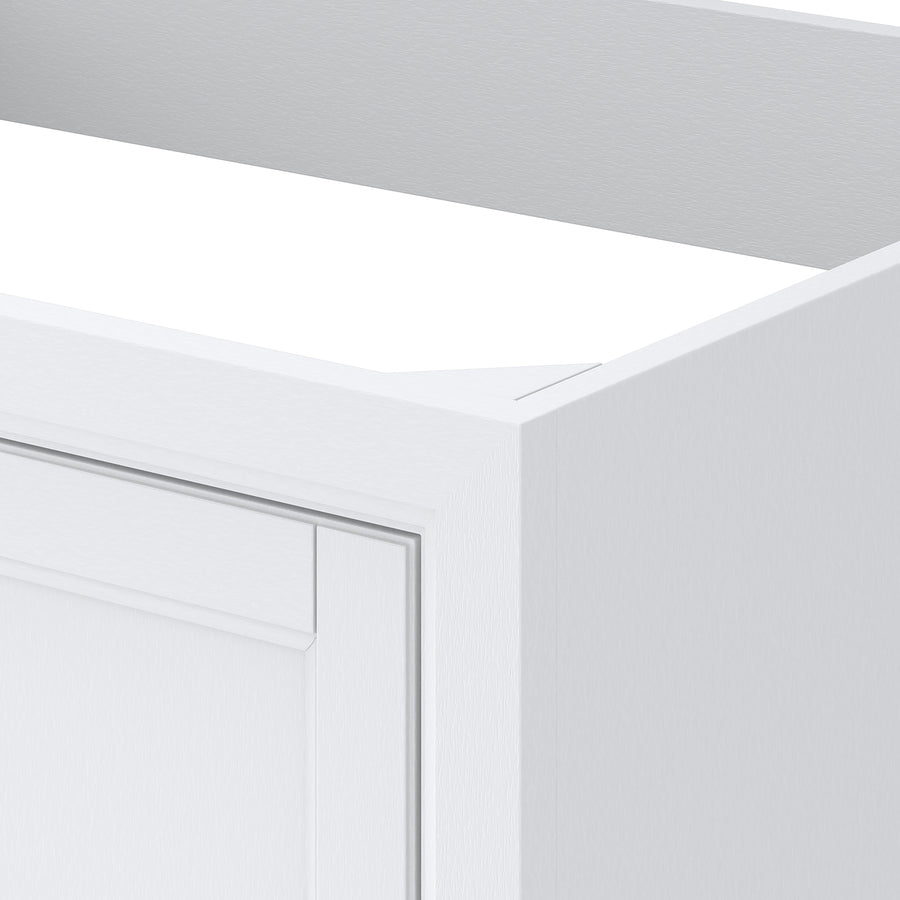 Close-up of a white, unfinished kitchen cabinet with clean, sharp edges and an open top, showing part of the interior and corner details.