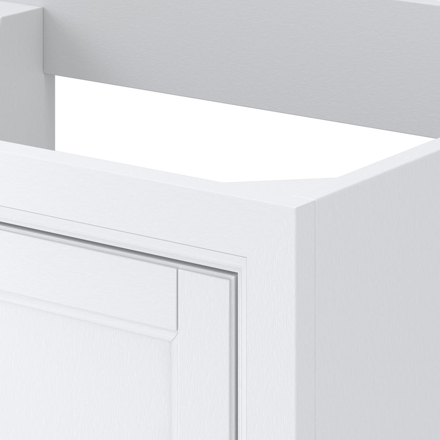 Close-up of a white kitchen cabinet corner with a rectangular cutout at the top, showing smooth, modern panels and clean lines.