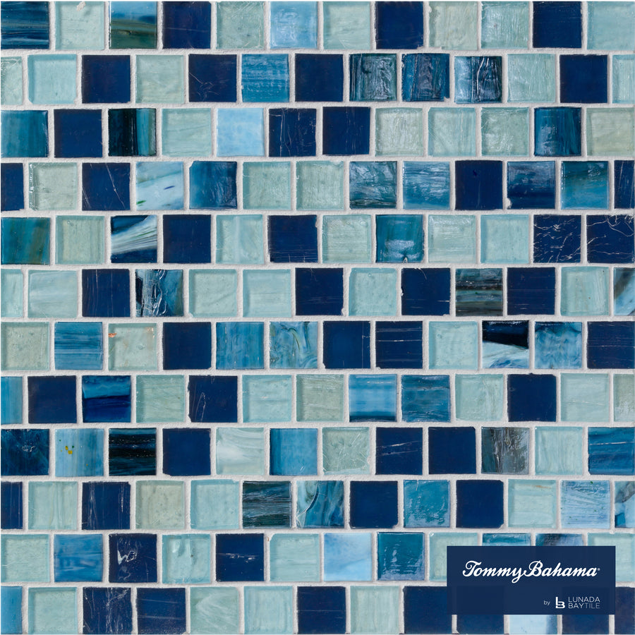 The Tommy Bahama Offset Mosaic Tile in Lucky Bay Mix features small square tiles with a glossy finish, perfect for accent walls. The Tommy Bahama and La Planda Baytile logos appear in the bottom right corner.