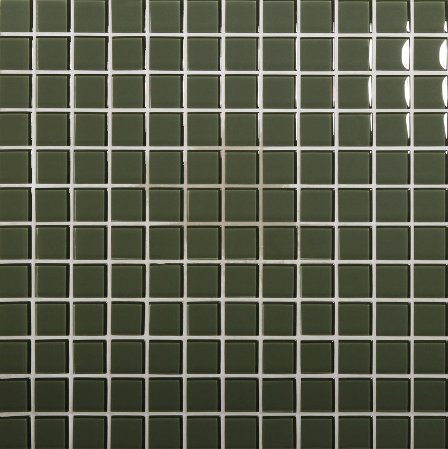 A grid of Tomei Mosaic Tile in Natural color, separated by white grout lines, covers the surface and reflects light in the upper right corner for a contemporary look.