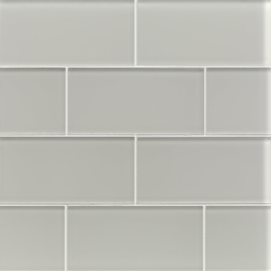 A close-up of a wall featuring Tomei 3" x 6" Subway Tile in Natural, arranged in a staggered brick pattern with white grout for a clean, contemporary look.