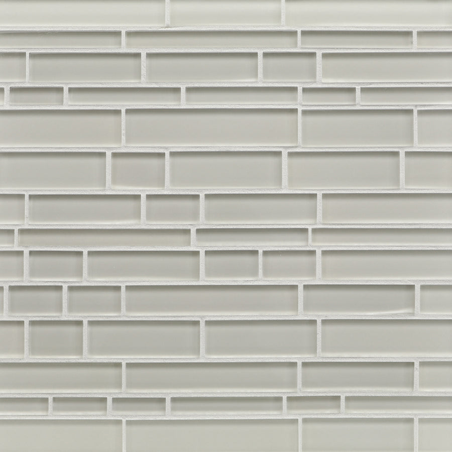 A close-up of a wall featuring Tomei Falling Water Mosaic Tile in Natural, arranged in a staggered brick pattern with white grout for a clean, modern look.