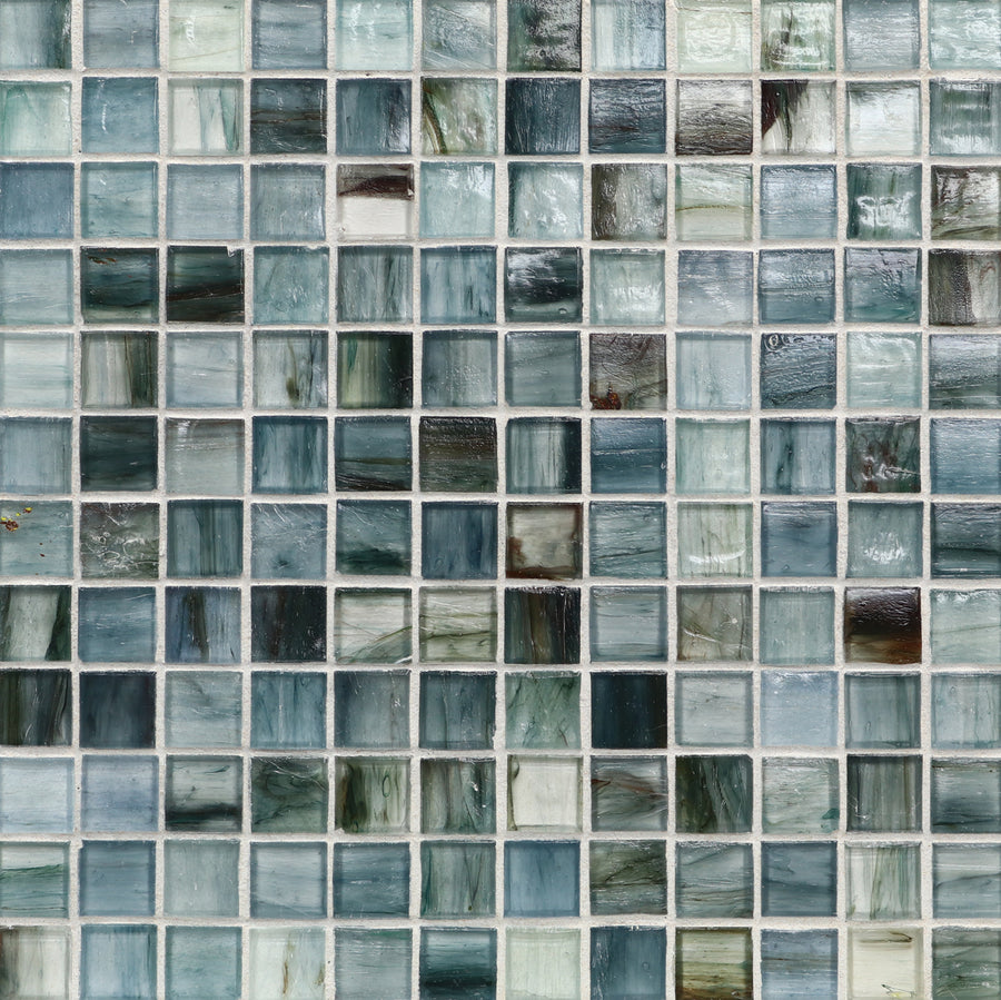 A close-up of a Tozen Mosaic Tile wall in the Mosaic Natural color, featuring small square glass tiles in a grid with white grout—ideal for elegant mosaic detailing on accent walls.