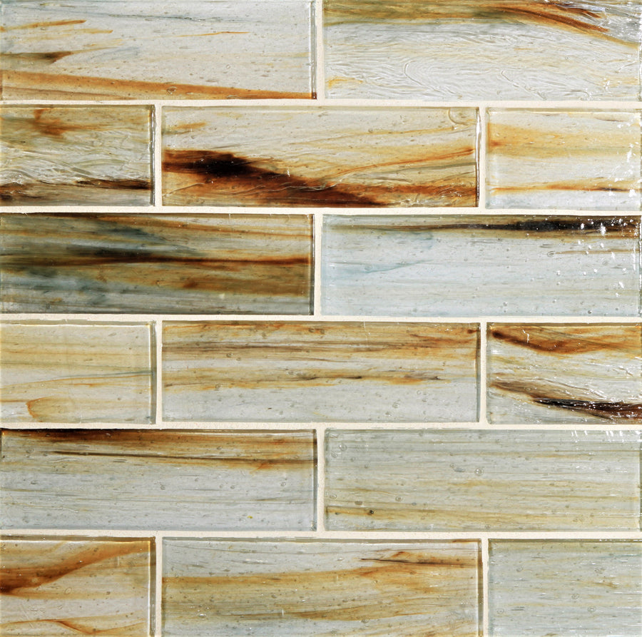 Tozen 2" x 6" Copper Subway Tile in Natural features a glossy metallic finish with marbled beige, brown, and cream streaks. Arranged in a brick pattern, these ceramic tiles display visible grout lines for added contemporary appeal.
