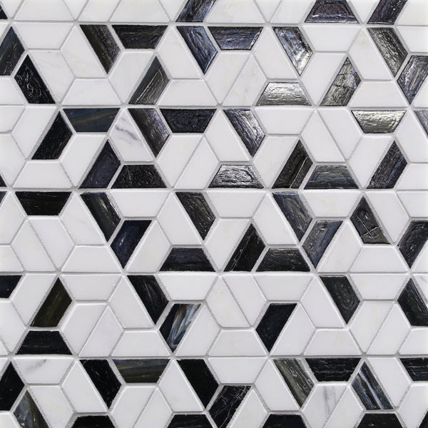 The Vesuvio Kindred Mosaic Tile in Night & Day features a contemporary geometric pattern of white, gray, and black ceramic hexagons and parallelograms arranged in a repeating, interlocking design.