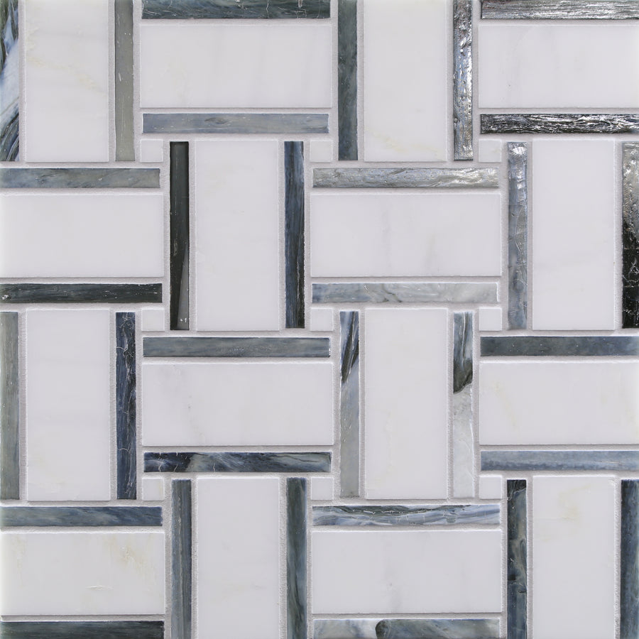 The Vesuvio Mosaic Tile in Panama Weave Rock features rectangular white tiles in an interlocking basketweave design, highlighted with gray and blue marble-look accents for a modern, durable, and structured appearance.