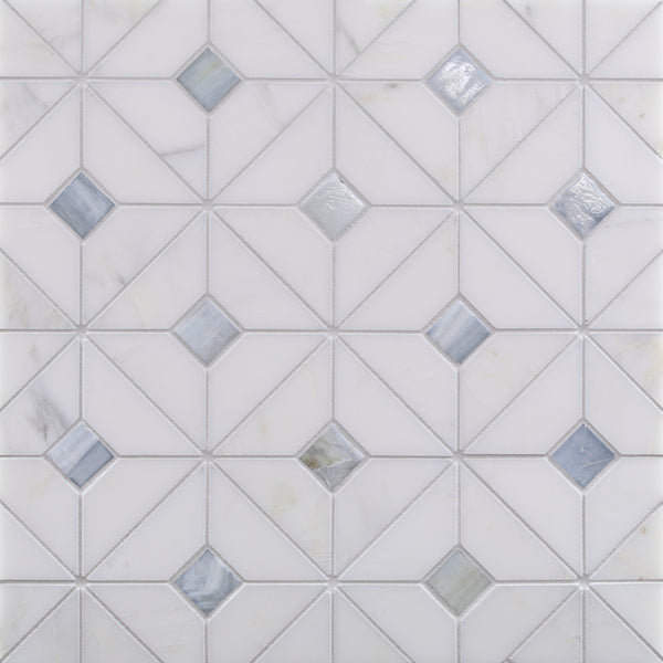 The Vesuvio Mosaic Tile in Quilt Calabria features a geometric pattern of white squares and triangles, with diamond-shaped gray and light blue tiles at intervals for a symmetrical, modern, and clean look.