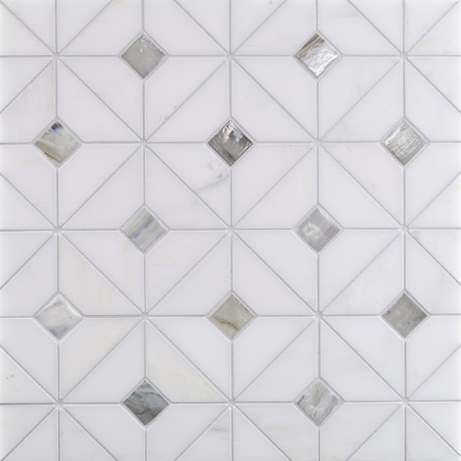 Featuring a white surface with geometric triangle diamonds and silvery-gray glass centers, the Vesuvio Quilt Mosaic Tile in Himalayan is ideal for modern backsplashes or accent walls, bringing a stylish, decorative accent.