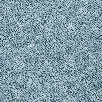 Fine Art On Trend Carpet in Lagoon features a soft, textured surface with a subtle repeating diamond pattern, offering contemporary elegance and gentle geometric design for a luxurious look.
