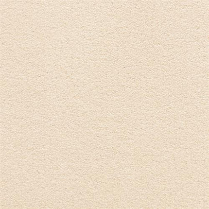 A close-up of the Grand Isle Family Friendly Carpet in Lambskin shows a soft, even beige texture with subtle grain, highlighting comfort and durability for any family space.