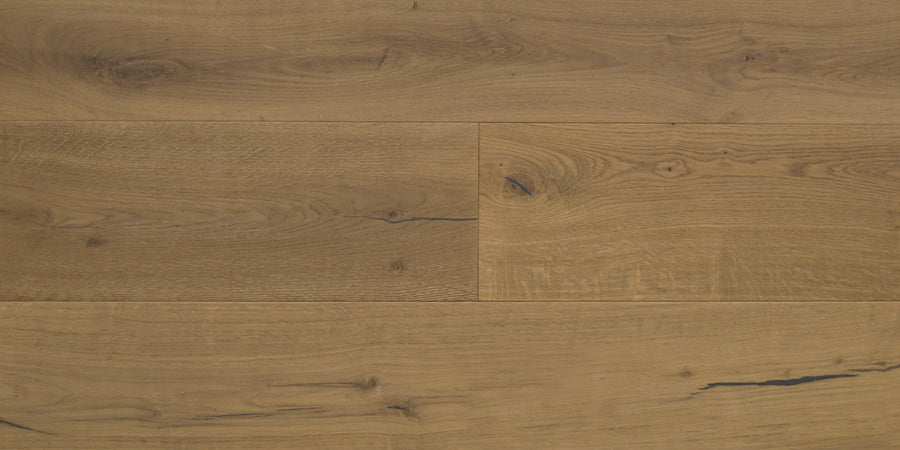 Close-up of Denali II 7 1/2" Hardwood flooring, featuring natural oiled-finish White Oak with visible grain, knots, and dark streaks for a warm, rustic look.