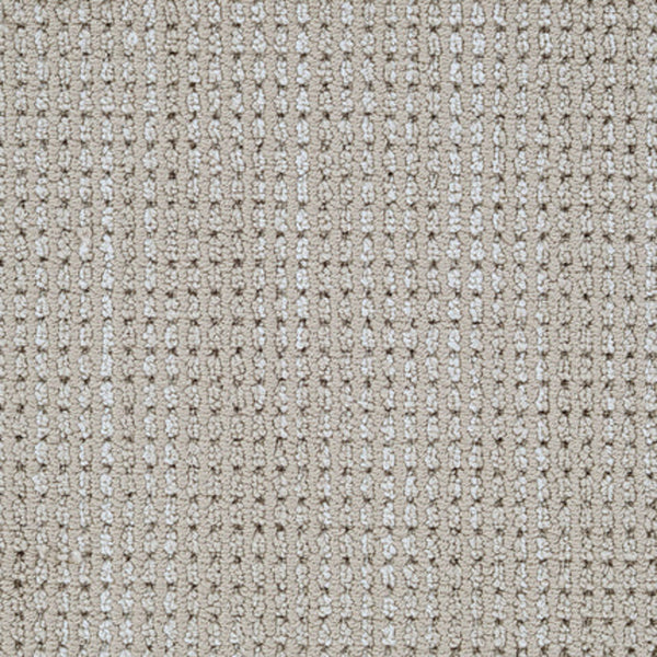 Close-up of Top Notch Berber Carpet in Latte, featuring a textured grid-like pattern with raised loops for a subtle checkerboard look. Tightly woven fibers provide durable, stain-resistant premium flooring.