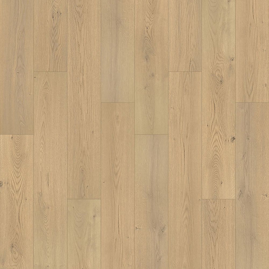 Aurora Falls 7 1/2" Waterproof Laminate in Latte Oak features light wood tones with a natural grain and subtle knots, a smooth finish, staggered plank layout, and advanced moisture-barrier technology for lasting durability.
