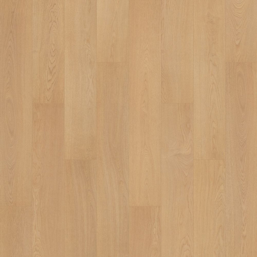 Oxford Manor 7.5" Vinyl Plank features light oak tones, a smooth matte finish, and subtle natural grain. Durable vinyl planks are installed in a staggered, seamless layout for a clean, uniform wood-look floor.