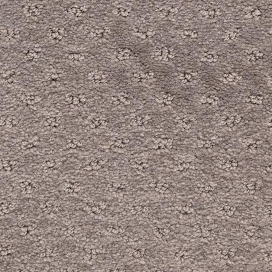 Close-up of Dreamer On Trend Carpet in Lava shows its plush, brown textured surface with evenly clustered raised patterns, offering a soft and slightly bumpy feel—perfect for luxury flooring.