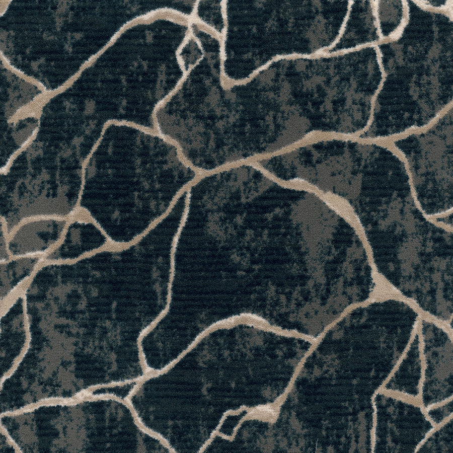 Leading Edge On Trend Carpet features a dark, durable design with an abstract pattern of irregular beige lines over a mottled black and gray background—offering modern style that's truly on trend.
