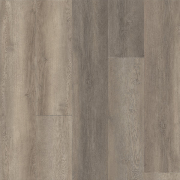Coretec Plus Premium Vinyl features wide planks in grey and light brown tones with natural wood grain and subtle knots. This luxury vinyl flooring is durable, waterproof, and ideal for any space.