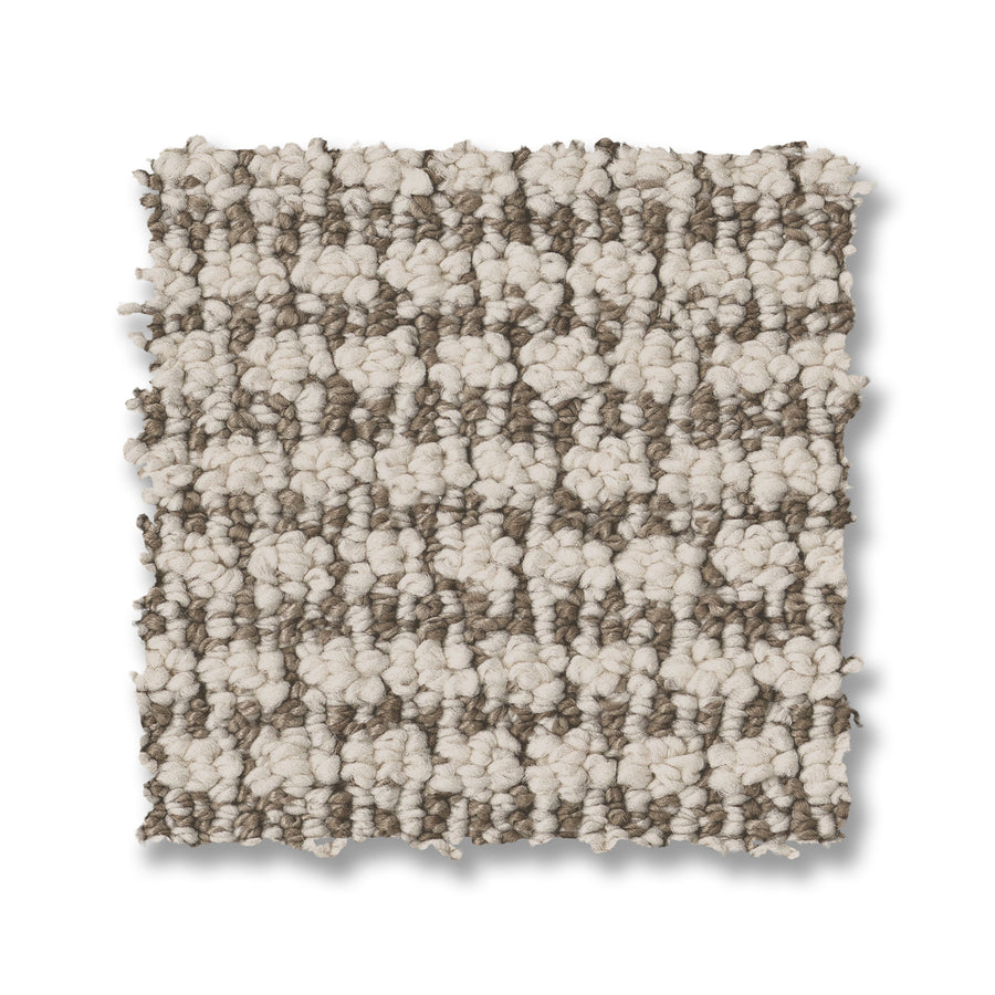 The Laine On Trend Carpet is a rectangular loop pile luxury carpet featuring a textured pattern in light beige and taupe on a white background.