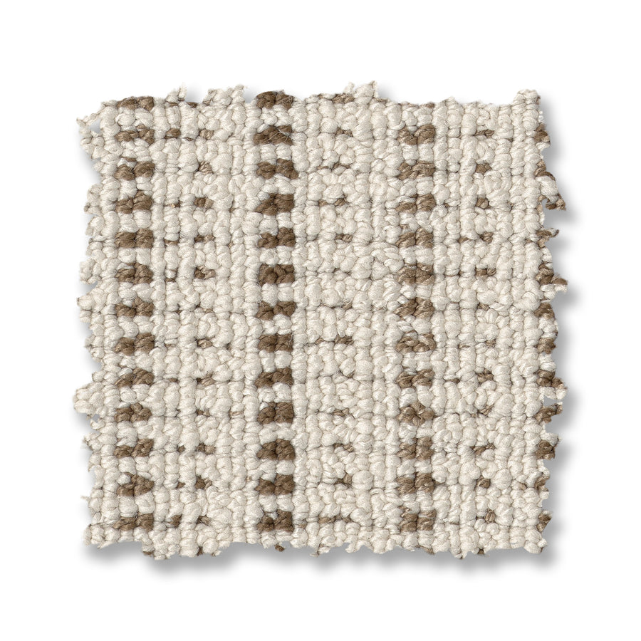 A square swatch of Laken On Trend Carpet features a cream base with vertical rows of small, evenly spaced brown loops for a striped look. The unfinished edges are slightly frayed, highlighting the carpet’s textured style.